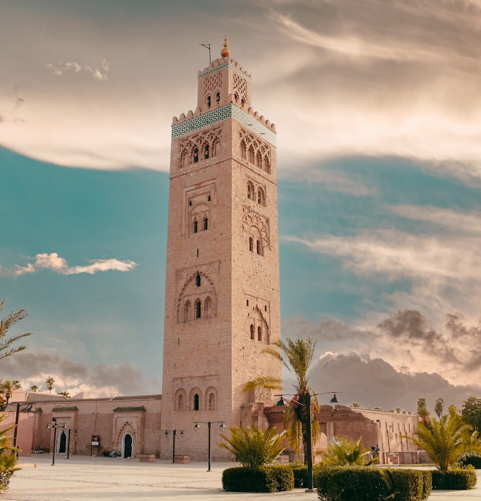 a tall tower with a clock on the top of it